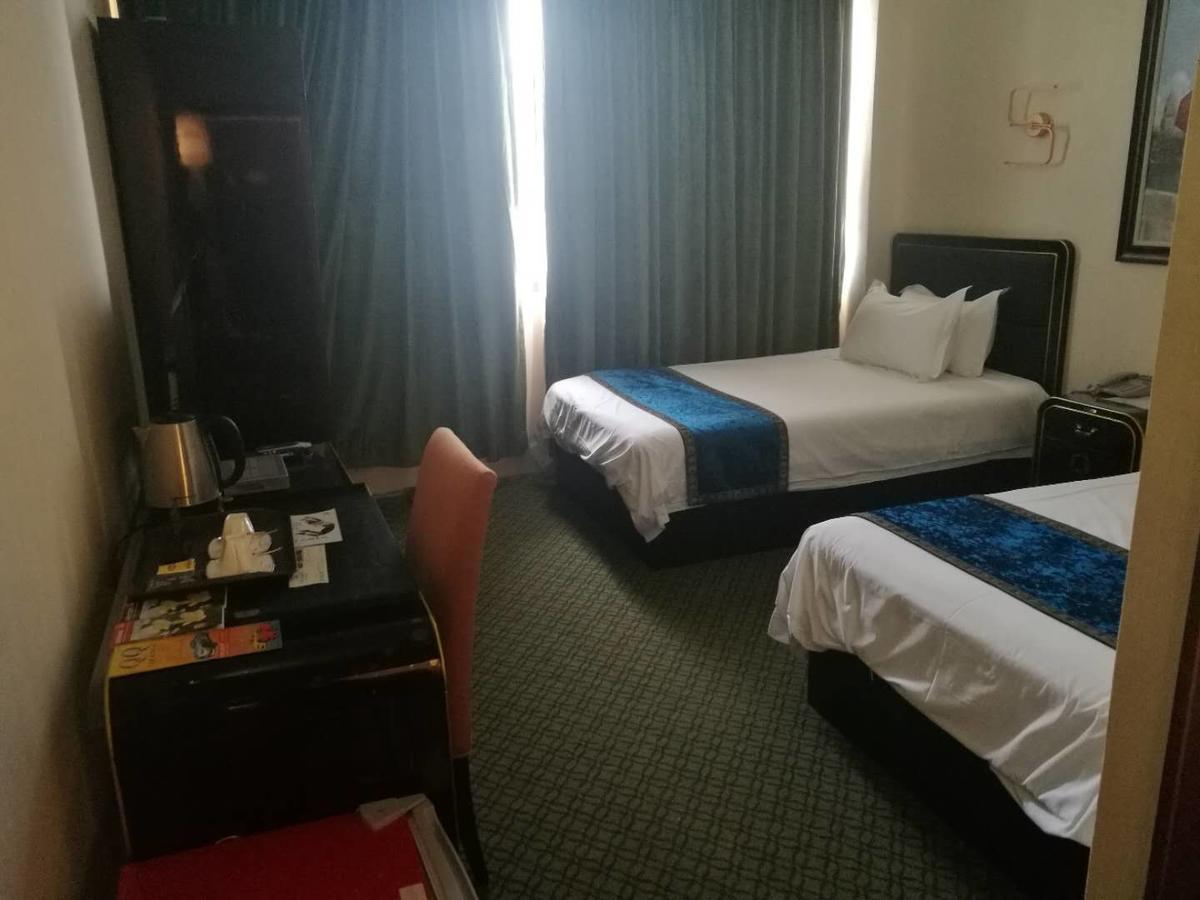 Star Sands Hotel Garapan Bagian luar foto